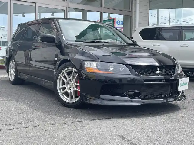 三菱 ランサー ワゴン GT－A エボリューション 青森県 2005(平17)年 13.2万km アメジストブラック 4WD/bremboブレーキキャリパー/MOMOステアリング/TEIN車庫調/Defiメーター/Recaroシート/HKSサイレントハイパワーマフラー/ACD(R6年ユニット交換済み）/17インチ純正アルミホイール/R6年車検時ヘッドライト/ディスクローター交換済み/社外エンジンスターター/社外オーディオ（BlueTooth/CD/ラジオ）/R2年102153キロ時タイミングベルト交換/取扱説明書/保証書
