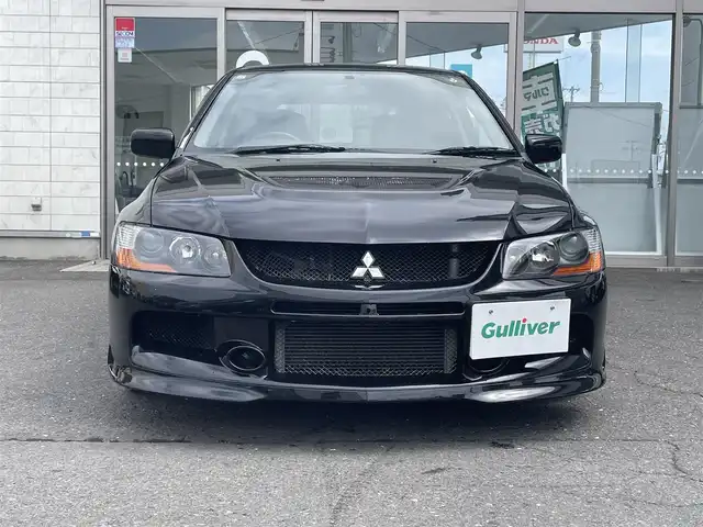 三菱 ランサー ワゴン GT－A エボリューション 青森県 2005(平17)年 13.2万km アメジストブラック 4WD/bremboブレーキキャリパー/MOMOステアリング/TEIN車庫調/Defiメーター/Recaroシート/HKSサイレントハイパワーマフラー/ACD(R6年ユニット交換済み）/17インチ純正アルミホイール/R6年車検時ヘッドライト/ディスクローター交換済み/社外エンジンスターター/社外オーディオ（BlueTooth/CD/ラジオ）/R2年102153キロ時タイミングベルト交換/取扱説明書/保証書