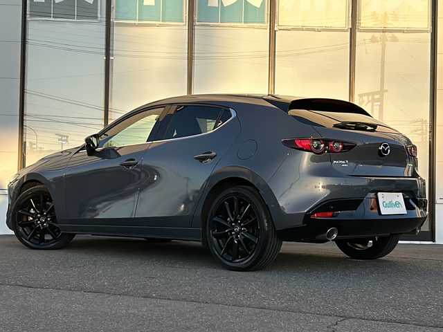 マツダ マツダ３ファストバック X Lパッケージ 山形県 2019(令1)年 3.9万km ポリメタルグレーM ４WD/純正ナビ/（AM/FM/フルセグ/BT）/ステアリングスイッチ/ステアリングヒーター/クルーズコントロール（追従有）/バックカメラ/全方位カメラ/BSM/レザーシート/運転席メモリ付きパワーシート/シートヒーター/BOSEサウンドシステム/オートＬＥＤヘッドライト/アダプティブハイビーム/スマートキー×２/電動格納ミラー/ETC/横滑り防止装置/レーンキープアシスト/プッシュスタート