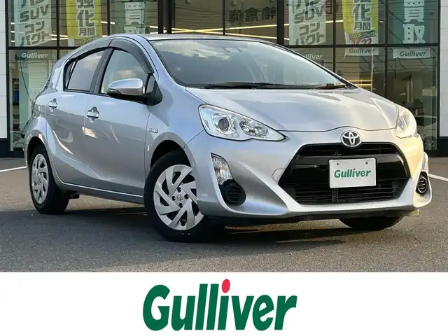 トヨタ アクア S 岡山県 2016(平28)年 16.7万km シルバーM 登録時走行距離166297km/ワンオーナー/純正ナビ/フルセグTV(AM/FM/CD/DVD/Bluetooth)/バックカメラ/ビルトインETC/ドライブレコーダー/トヨタセーフティセンスC/・プリクラッシュセーフティ/・オートマチックハイビーム/・レーンディバーチャーアラート/横滑り防止装置/純正フロアマット/電動格納ミラー/ヘッドライトレベライザー/ステアリングスイッチ/プッシュスタート/スマートキー