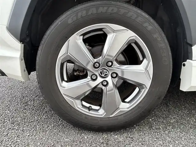 トヨタ ＲＡＶ４ ハイブリットG 福岡県 2019(令1)年 8.3万km ホワイトパールクリスタルシャイン ・純正ナビ　9インチ/（BLUETOOTH/フルセグ/バックカメラ/DVD再生/・ワンオーナー/・ETC/・クルーズコントロール/・コーナーセンサー/・クリアランスソナー/・衝突軽減システム/・レーンキープアシスト/・電動リアゲート/・電動格納ミラー/・純正フロアマット/・CDチェンジャー/・ドアバイザー/・プッシュスタート/・AC100V/・保証書/・取扱説明書