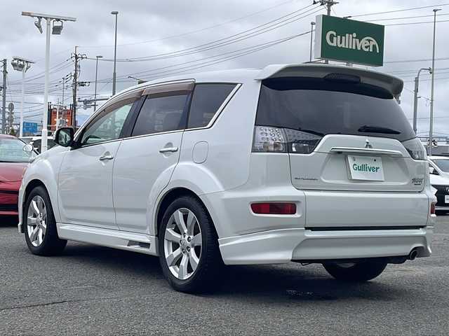 三菱 アウトランダー ナビコレ ROADEST 24G 徳島県 2011(平23)年 11.3万km ピュアホワイトP HDDナビ　J-05/バックカメラ/ETC/LEDヘッドライト/ハーフレザーシート/純正サイドエアロ/純正18インチアルミホイール/パドルシフト/純正フロアマット/純正ドアバイザー/ステアリングリモコン/センターコンソール/取扱説明書