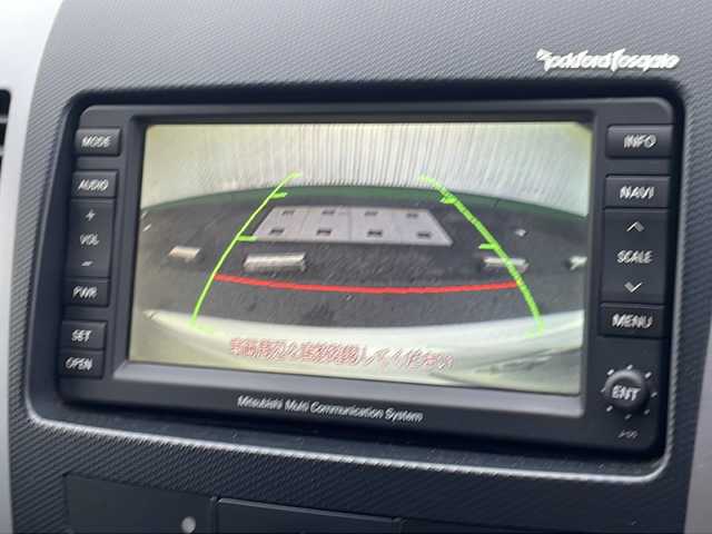 三菱 アウトランダー ナビコレ ROADEST 24G 徳島県 2011(平23)年 11.3万km ピュアホワイトP HDDナビ　J-05/バックカメラ/ETC/LEDヘッドライト/ハーフレザーシート/純正サイドエアロ/純正18インチアルミホイール/パドルシフト/純正フロアマット/純正ドアバイザー/ステアリングリモコン/センターコンソール/取扱説明書