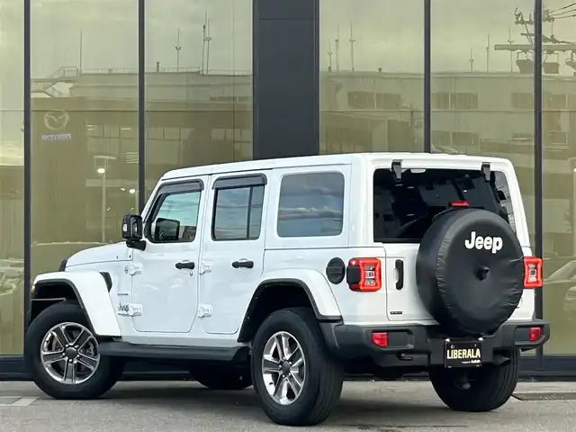 クライスラー・ジープ ラングラー アンリミテッド サハラ 石川県 2021(令3)年 3.4万km ブライトホワイト ワンオーナー/4WD/純正ナビ/　Bluetooth・USB・AUX・AppleCarPlay/ALPINEサウンド/フルセグTV/ETC2.0/バックカメラ/前後ドライブレコーダー/アダプティブクルーズコントロール/ブラインドスポットモニター/シートヒーター/ステアリングヒーター/アンチロック・ブレーキ・システム/衝突被害軽減システム/横滑り防止装置/前後コーナーセンサー/盗難防止装置/オートマチックハイビーム/ダウンヒルアシストコントロール/純正アルミホイール/スマートキー