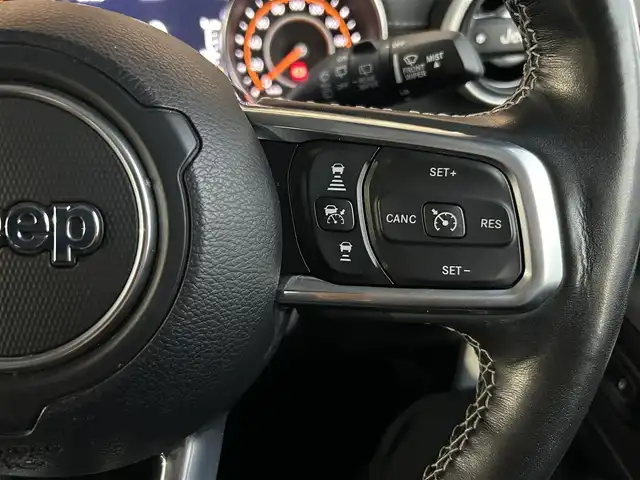 クライスラー・ジープ ラングラー アンリミテッド サハラ 石川県 2021(令3)年 3.4万km ブライトホワイト ワンオーナー/4WD/純正ナビ/　Bluetooth・USB・AUX・AppleCarPlay/ALPINEサウンド/フルセグTV/ETC2.0/バックカメラ/前後ドライブレコーダー/アダプティブクルーズコントロール/ブラインドスポットモニター/シートヒーター/ステアリングヒーター/アンチロック・ブレーキ・システム/衝突被害軽減システム/横滑り防止装置/前後コーナーセンサー/盗難防止装置/オートマチックハイビーム/ダウンヒルアシストコントロール/純正アルミホイール/スマートキー