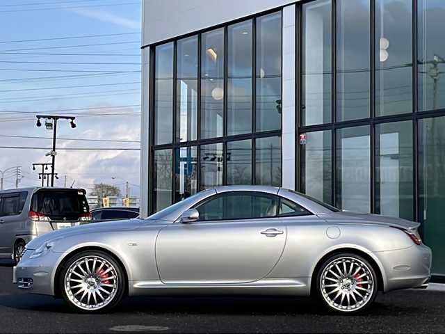 レクサス ＳＣ 430 道央・札幌 2006(平18)年 11.6万km プレミアムシルバーM 純正ナビ/【ＣＤ／ＭＤ／ＡＵＸ／ＴＶ】/マークレビンソン/バックカメラ/レザーシート/前席シートヒーター/前席パワーシート／シートメモリ/ＬＥＤ/フォグランプ/オートライト/横滑り防止装置/エアサスペンション【カズサス】/社外マフラー/ウッドコンビステアリング/クルーズコントロール/電動格納ミラー/ミラーヒーター