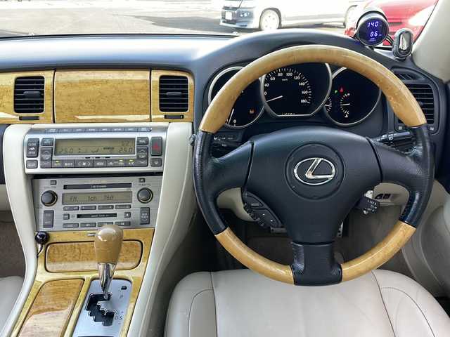 レクサス ＳＣ 430 道央・札幌 2006(平18)年 11.6万km プレミアムシルバーM 純正ナビ/【ＣＤ／ＭＤ／ＡＵＸ／ＴＶ】/マークレビンソン/バックカメラ/レザーシート/前席シートヒーター/前席パワーシート／シートメモリ/ＬＥＤ/フォグランプ/オートライト/横滑り防止装置/エアサスペンション【カズサス】/社外マフラー/ウッドコンビステアリング/クルーズコントロール/電動格納ミラー/ミラーヒーター