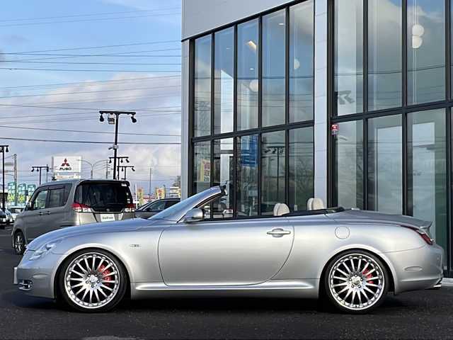 レクサス ＳＣ 430 道央・札幌 2006(平18)年 11.6万km プレミアムシルバーM 純正ナビ/【ＣＤ／ＭＤ／ＡＵＸ／ＴＶ】/マークレビンソン/バックカメラ/レザーシート/前席シートヒーター/前席パワーシート／シートメモリ/ＬＥＤ/フォグランプ/オートライト/横滑り防止装置/エアサスペンション【カズサス】/社外マフラー/ウッドコンビステアリング/クルーズコントロール/電動格納ミラー/ミラーヒーター