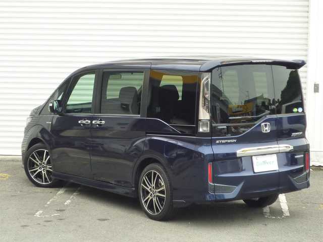 ホンダ ステップワゴン スパーダ ハイブリッド G ホンダセンシング 和歌山県 2018(平30)年 6.8万km オブシダンブルーパール 社外7インチメモリナビ(AVIC-RZ801)/  フルセグTV/CD/DVD/BT/USB/バックカメラ/両側パワースライドドア/10.2型フリップダウンモニター/ホンダセンシング/・衝突軽減ブレーキ/・誤発進抑制機能/・追従クルーズコントロール/・レーンキープアシスト/シートバックテーブル/ビルトインETC/LEDヘッドライト/LEDフォグライト/社外１９インチアルミホイール/スペアキーX1/取扱説明書/保証書