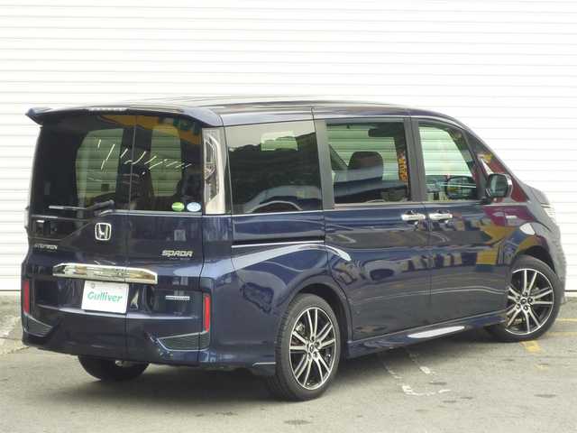 ホンダ ステップワゴン スパーダ ハイブリッド G ホンダセンシング 和歌山県 2018(平30)年 6.8万km オブシダンブルーパール 社外7インチメモリナビ(AVIC-RZ801)/  フルセグTV/CD/DVD/BT/USB/バックカメラ/両側パワースライドドア/10.2型フリップダウンモニター/ホンダセンシング/・衝突軽減ブレーキ/・誤発進抑制機能/・追従クルーズコントロール/・レーンキープアシスト/シートバックテーブル/ビルトインETC/LEDヘッドライト/LEDフォグライト/社外１９インチアルミホイール/スペアキーX1/取扱説明書/保証書