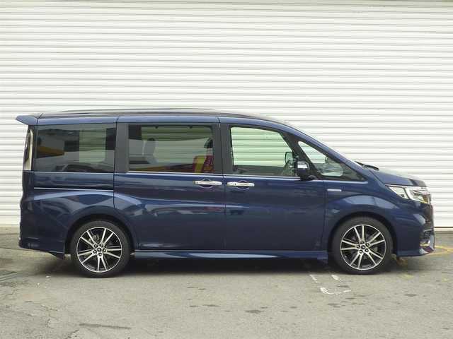 ホンダ ステップワゴン スパーダ ハイブリッド G ホンダセンシング 和歌山県 2018(平30)年 6.8万km オブシダンブルーパール 社外7インチメモリナビ(AVIC-RZ801)/  フルセグTV/CD/DVD/BT/USB/バックカメラ/両側パワースライドドア/10.2型フリップダウンモニター/ホンダセンシング/・衝突軽減ブレーキ/・誤発進抑制機能/・追従クルーズコントロール/・レーンキープアシスト/シートバックテーブル/ビルトインETC/LEDヘッドライト/LEDフォグライト/社外１９インチアルミホイール/スペアキーX1/取扱説明書/保証書