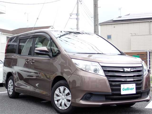 トヨタ ノア X 千葉県 2014(平26)年 6.7万km ダークシェリーマイカM 純正9インチナビゲーション/・Bluetooth/CD/DVD/AM/FM/バックカメラ/ビルトインETC/片側パワースライドドア/プッシュスタート/スマートキー/アイドリングストップ/ステアリングスイッチ/ウィンカーミラー/電動格納ミラー/純正フロアマット/ドアバイザー/LEDヘッドライト/取扱説明書