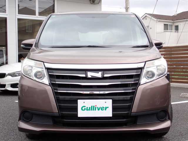 トヨタ ノア X 千葉県 2014(平26)年 6.7万km ダークシェリーマイカM 純正9インチナビゲーション/・Bluetooth/CD/DVD/AM/FM/バックカメラ/ビルトインETC/片側パワースライドドア/プッシュスタート/スマートキー/アイドリングストップ/ステアリングスイッチ/ウィンカーミラー/電動格納ミラー/純正フロアマット/ドアバイザー/LEDヘッドライト/取扱説明書