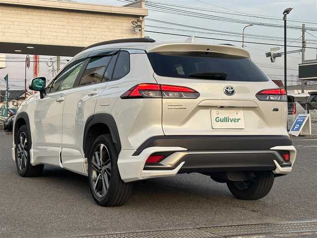 トヨタ カローラ クロス ハイブリッド Z 広島県 2023(令5)年 7万km プラチナホワイトパールマイカ ワンオーナー/純正メモリナビ/　（Bluetooth/フルセグテレビ/AM/FM）/レーダークルーズコントロール/モデリスタエアロ/全方位モニター/ブラインドスポットモニター/電子パーキング/オートブレーキホールド/ビルトインETC/パワーシート/シートヒーター/純正18インチアルミホイール/ルーフレール/純正フロアマット/コーナーセンサー/レーンキープアシスト/横滑り防止装置/衝突被害軽減システム/オートマチックハイビーム/LEDヘッドライト/フォグランプ/カーテンエアバック/スペアキー/保証書/取扱説明書