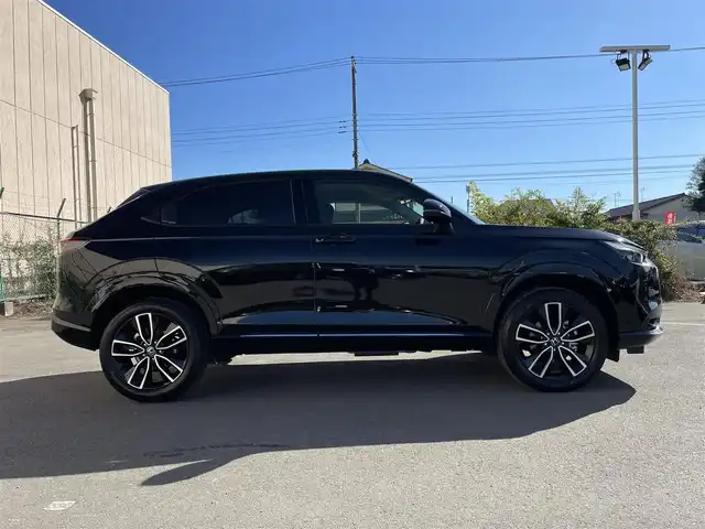 ホンダ ヴェゼル ハイブリッド e:HEV Z 東京都 2025(令7)年 0.1千km クリスタルブラックパール 登録済未使用車 /純正９型コネクティッドナビフルセグ /・BluetoothAudio/USB/・AppleCarPlay/AnudoidAuto/BOSEサウンドシステム　/パワーバックドア /置くだけ充電/ホンダセンシング　/（安全運転支援システム）/・衝突軽減ブレーキ/・アダプティブクルーズコントロール/・パーキングセンサーシステム/・車線維持支援システム/・標識認識機能/LEDヘッドランプ　/前席シートヒーター /ステアリングヒーター /D席パワーシート /ビルトインETC2.0/プッシュエンジンスタート/Wエアバック＆ABS/保証書＆取説