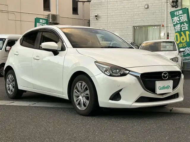 マツダ デミオ 13S 岡山県 2018(平30)年 6.7万km スノーフレイクホワイトパールマイカ 登録時走行距離66929km/純正ナビ/(AM/FM/TV/DISC/BT/USB)/衝突被害軽減システム/レーンキープアシスト/アイドリングストップ/全方位カメラ/ETC/ドライブレコーダー/D+Nシートヒーター/オートマチックハイビーム/プッシュスタート/スマートキー/MTモード付AT/パワーウィンドウ/パワーステアリング