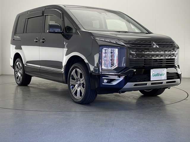 三菱 デリカＤ：５ ジャスパー 宮崎県 2023(令5)年 1.2万km グラファイトグレーメタリック/ブラックマイカ 禁煙車/衝突被害軽減ブレーキ/純正10.1型ナビ/（CD/DVD/Bluetooth/HDMI/MSV/FMAM）/純正LEDオートライト/純正LEDフォグ/純正18インチアルミ/純正フロアマット/社外ドライブレコーダー/両側電動スライドドア/パワーバックドア/パノラミックビューモニター/アダプティブクルーズコントロール/レーンディパーチャーアラート/オートマチックハイビーム/ブラインドスポットモニター/電子パーキング/オートホールド/デュアルオートエアコン/パドルシフト/ステアリングヒーター/本革巻ハンドル/ETC/スマートキー/プッシュエンジンスタート/新車時保証書/取扱い説明書