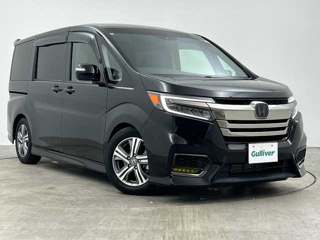 ホンダ ステップワゴン スパーダ クルスピセンシング 三重県 2022(令4)年 1.8万km プレミアムスパークルブラックパール /禁煙車//純正9型メモリーナビ//バックカメラ//WAC//DN席シートヒーター//MTモード付AT//パドルシフト//革巻きステアリング//ステアリングスイッチ//ホンダセンシング//衝突軽減ブレーキ//レーンキープアシスト//レーダークルーズコントロール//両側パワースライドドア//純正ビルトインETC2.0//純正前方ドライブレコーダー//LED//フォグ//ハーフレザーシート//サイドカーテンエアバッグ//車高調