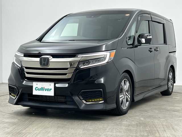 ホンダ ステップワゴン スパーダ クルスピセンシング 三重県 2022(令4)年 1.8万km プレミアムスパークルブラックパール /禁煙車//純正9型メモリーナビ//バックカメラ//WAC//DN席シートヒーター//MTモード付AT//パドルシフト//革巻きステアリング//ステアリングスイッチ//ホンダセンシング//衝突軽減ブレーキ//レーンキープアシスト//レーダークルーズコントロール//両側パワースライドドア//純正ビルトインETC2.0//純正前方ドライブレコーダー//LED//フォグ//ハーフレザーシート//サイドカーテンエアバッグ//車高調