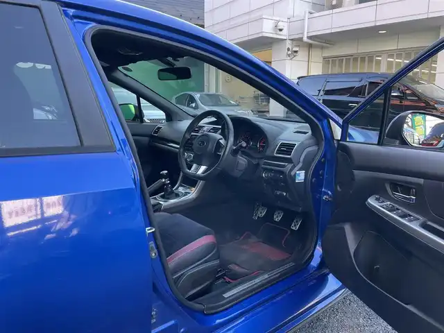 スバル ＷＲＸ ＳＴＩ STI 東京都 2015(平27)年 4.2万km WRブルーパール ワンオーナー/STIフロントアンダースポイラー/STIサイドアンダースポイラー/STIフロントグリル/STIスカートリップ/大型リアスポイラー/純正18インチアルミホイール/メモリーナビ（AVIC-RZ09）/・フルセグTV/DVD/Bluetooth//・ナビ連動純正ドライブレコーダー前後（VREC-DS800DC）/バックカメラ/オールウェザーパック/純正フロアマット/スペアタイヤ/新車時保証書/取扱説明書/ディーラー整備記録簿/・H28/8　H29/8  H30/8  R1/7  R2/8  R3/8  R4/8  R5/8  R6/8  R7/7