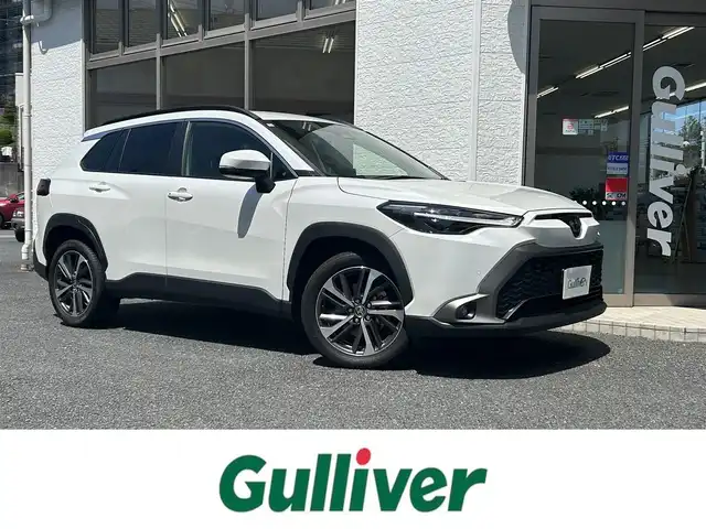 トヨタ カローラ クロス Z 神奈川県 2024(令6)年 1.7万km プラチナホワイトパールマイカ 純正ナビ(Bluetooth/TV/USB)/クルーズコントロール/MTモード付AT/D席パワーシート/前席シートヒーター/ブラインドスポットモニター/バックカメラ/オートブレーキホールド/パワーバックドア/コーナーセンサー/オートライト/オートマチックハイビーム/ETC/ワンオーナー/純正アルミホイール/純正フロアマット/取扱説明書/保証書/プッシュスタート