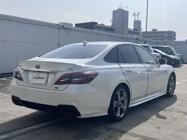 トヨタ クラウン ハイブリッド RS 広島県 2018(平30)年 5.7万km ホワイトパールクリスタルシャイン 　　　　　○走行距離：56685km（入庫時）/保証書＆取説あり/プッシュスタート（スペアキーなし）/純正ナビ/・Bluetooth/・フルセグTV/純正フロアマット/セーフティセンス/ドライブセレクトモード/・SPORT S＋/SPORTS/NORMAL(etc....)/コーナーセンサー/SRSエアバック/・運転席/助手席/サイド/カーテン/ニー/ブラインドスポットモニター/オートライト/オートマチックハイビーム/社外デジタルインナーミラー/ドライブレコーダー/M付きAT（パドルシフト）/パワーシート（運転席/助手席）/シートヒーター（運転席/助手席）/ステアリングヒーター/ドライブモード連動オプティトロンメーター/　　　　　　　　　○タイヤサイズ/・225/45/R18/・純正18インチ5本スポークアルミホイール