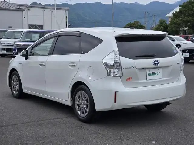 トヨタ プリウス α S チューンブラック 鹿児島県 2014(平26)年 9.3万km ホワイトパールクリスタルシャイン 純正ナビ/バックカメラ/ビルトインＥＴＣ/スマートキー/プッシュスタート/本革巻きステアリング/オートライト/ＬＥＤヘッドライト/フルセグＴＶ/ｂｌｕｅｔｏｏｔｈ接続/フルフラットシート/アイドリングストップ/オートエアコン/スマートキー/エンジンスタートボタン/ミュージックプレイヤー接続/純正フロアマット/純正アルミホイール
