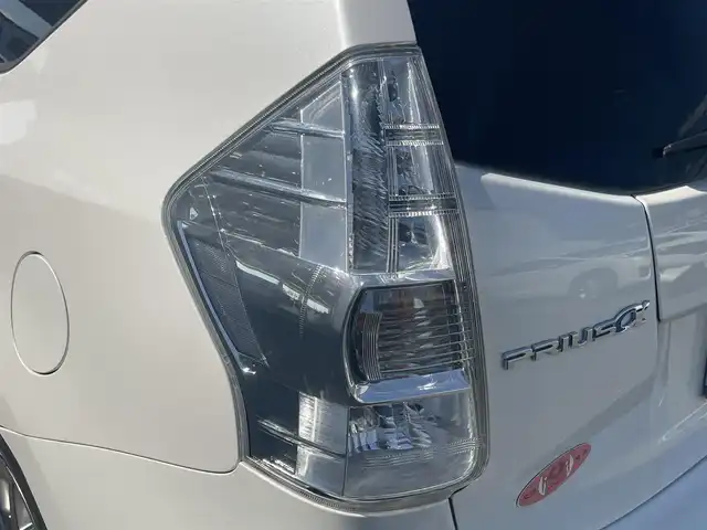 トヨタ プリウス α S チューンブラック 愛知県 2014(平26)年 9.3万km ホワイトパールクリスタルシャイン (株)IDOMが運営する【じしゃロン豊川店】の自社ローン専用車両になります。こちらは現金またはオートローンご利用時の価格です。自社ローンご希望の方は別途その旨お申付け下さい/ 純正ディーラーナビ/　◯ CD再生機能/　◯ DVD再生機能/　◯ BT対応/　◯ フルセグTV/ 革巻ステアリング/ ステアリングスイッチ/ バックカメラ/ ETC/ ウインカーミラー/ シートカバー/ プッシュスタート/ オートライト/ 純正フロアマット