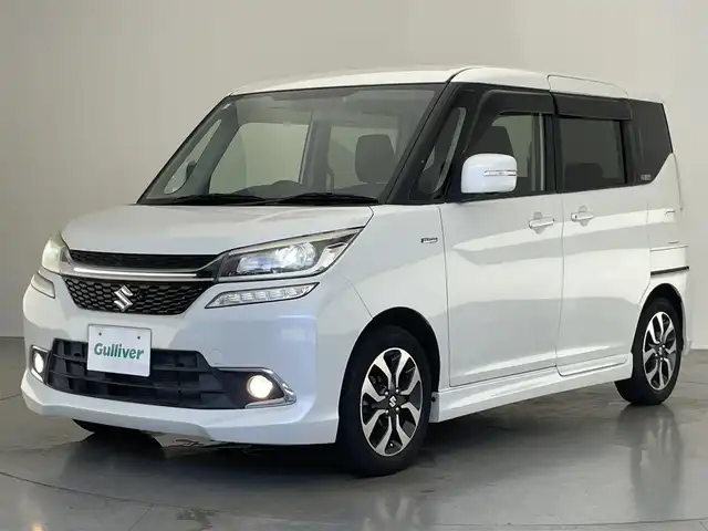 スズキ ソリオ バンディット HV MV Dカメラ ブレーキS 愛知県 2017(平29)年 5.8万km ピュアホワイトP 純正ナビ　フルセグＴＶ　Ｂｌｕｅｔｏｏｔｈ　ＵＳＢ　シートヒーター　両側パワースライドドア　デュアルカメラブレーキ　衝突軽減　車線逸脱　クルコン　ＬＥＤオートライト　プッシュスタート　フォグランプ　TVキャンセラー　禁煙車