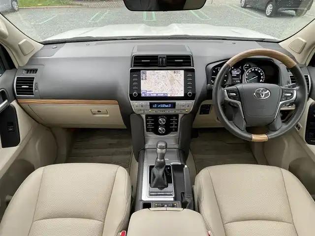 トヨタ ランドクルーザー プラド TZ－G 静岡県 2022(令4)年 2.4万km ホワイトパールクリスタルシャイン トヨタセーフティセンス/ターボ/純正9型メーカーナビ/・フルセグTV/BTオーディオ/USB/全方位カメラ/ビルトインETC2.0/ドラレコ前方/サンルーフ/ベージュ革/メモリーシート/パワーシートD/N/シートヒーターD/N/シートクーラーD/N/三列シート/電動格納シート/パドルシフト/LEDヘッドランプ/フォグランプ/純正フロアマット/ドアバイザー/スマートキー/スペアキー/保証書/取扱説明書/純正19アルミホイール
