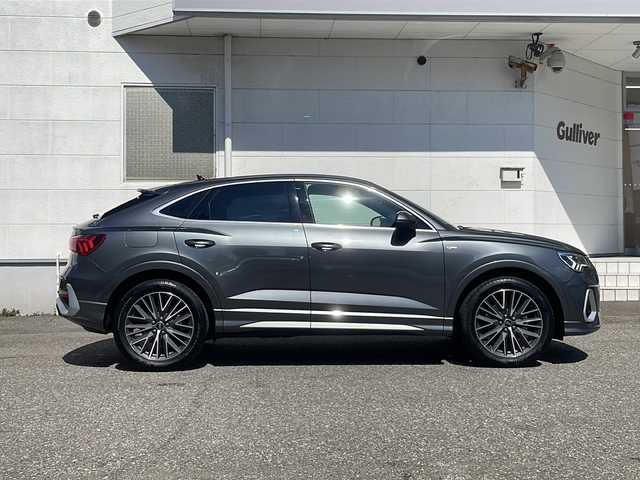 アウディ Ｑ３ SB 35TFSI Sライン 福井県 2023(令5)年 1.1万km デイトナグレーパールエフェクト Sライン/ターボ/メーカー純正ナビゲーション/（Bluetooth）/360°カメラ/アダプティブクルーズコントロール/レーンキープアシスト/プリクラッシュセーフティ/純正19インチアルミホイール/クリアランスソナー /パワーバックドア/前席パワーシート /エアーシート/シートヒーター /LEDヘッドライト/ハーフレザーシート/パドルシフト/LIMスイッチ/ドライブレコーダー /ETC2.0(ビルトイン)/アイドリングストップ/オートライト/ミラーヒーター/オートリトラミラー /プッシュスタート/スマートキー/保証書/取扱説明書