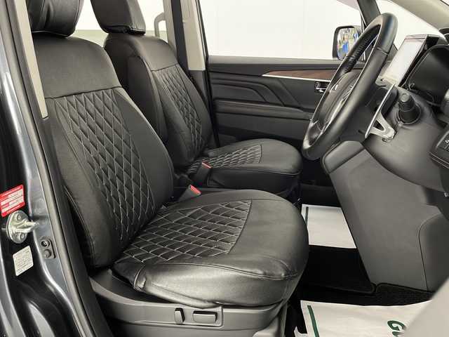 三菱 デリカＤ：５ ジャスパー 宮崎県 2023(令5)年 1.2万km グラファイトグレーメタリック/ブラックマイカ 禁煙車/衝突被害軽減ブレーキ/純正10.1型ナビ/（CD/DVD/Bluetooth/MSV/HDMI/AUX)/純正LEDオートライト/純正LEDフォグ/純正18インチアルミ/純正フロアマット/社外革調シートカバー/社外ドライブレコーダー/両側電動スライドドア/パワーバックドア/アダプティブクルーズコントロール/レーンディパーチャーアラート/ブラインドスポットモニター/パノラミックビューモニター/電子パーキング/オートホールド/クリアランスソナー/パドルシフト/ステアリングヒーター/デュアルオートエアコン/本革巻ハンドル/運転席パワーシート/前席シートヒーター/スマートキー/プッシュエンジンスタート/新車時保証書/取扱い説明書