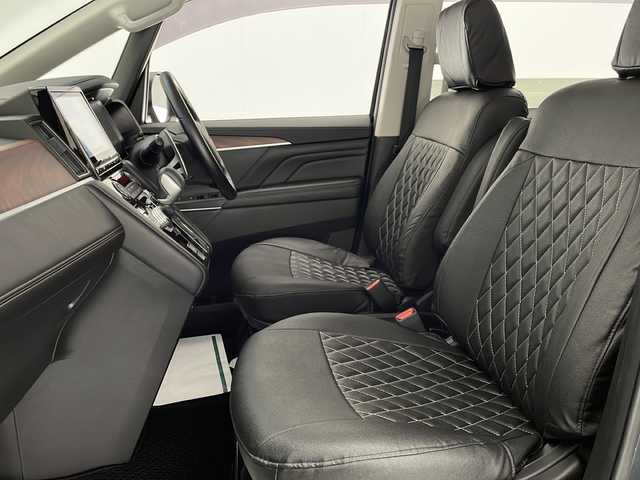 三菱 デリカＤ：５ ジャスパー 宮崎県 2023(令5)年 1.2万km グラファイトグレーメタリック/ブラックマイカ 禁煙車/衝突被害軽減ブレーキ/純正10.1型ナビ/（CD/DVD/Bluetooth/MSV/HDMI/AUX)/純正LEDオートライト/純正LEDフォグ/純正18インチアルミ/純正フロアマット/社外革調シートカバー/社外ドライブレコーダー/両側電動スライドドア/パワーバックドア/アダプティブクルーズコントロール/レーンディパーチャーアラート/ブラインドスポットモニター/パノラミックビューモニター/電子パーキング/オートホールド/クリアランスソナー/パドルシフト/ステアリングヒーター/デュアルオートエアコン/本革巻ハンドル/運転席パワーシート/前席シートヒーター/スマートキー/プッシュエンジンスタート/新車時保証書/取扱い説明書