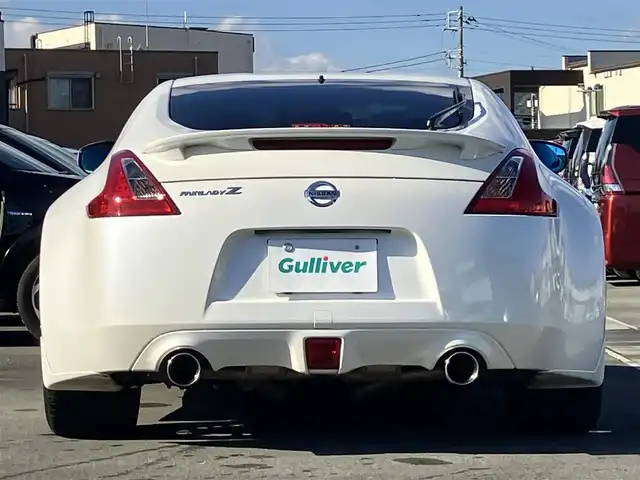 日産 フェアレディ Ｚ バージョンT 静岡県 2011(平23)年 10万km ブリリアントホワイトパール HKSハイパフォーマンスエキゾーストマフラー/WORK Varianza19インチアルミホイール /純正ナビ（CD/フルセグ）/バックカメラ/ドライブレコーダー前後/ETC/パドルシフト/エンジンスタートボタン/パワーステアリング/パワーウィンドウ/スマートキー/オートエアコン/フロアマット/D席N席パワーシート/D席N席シートヒーター/ハーフレザーシート（本革＆布）/フロントエアロ/ABS/横滑り防止装置/オートライト/キセノン/W+サイドエアバッグ/BOSE/ブルーレンズミラー