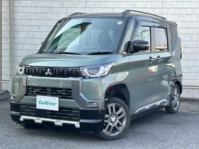 三菱 デリカミニ T プレミアム 大分県 2024(令6)年 2.9万km 緑 〇ワンオーナー/〇ハーフレザーシート/〇純正メモリーナビ（MM223D-LM）/　ラジオ・BT・USB/〇全方位カメラ/〇ETC/〇純正LEDヘッドライト/〇純正フォグランプ/〇スマートキー/〇エンジンプッシュスタート/〇パドルシフト/〇ACC/〇LKA/〇MI-PILOT/〇両側パワースライドドア/〇ルーフレール/〇アイドリングストップ/〇ステアリングヒーター/〇ステアリングスイッチ/〇フロアマット/〇ドアバイザー/〇プライバシーガラス/〇前後ドライブレコーダー/〇ウインカーミラー/〇保証書/〇取扱説明書/〇スペアキー