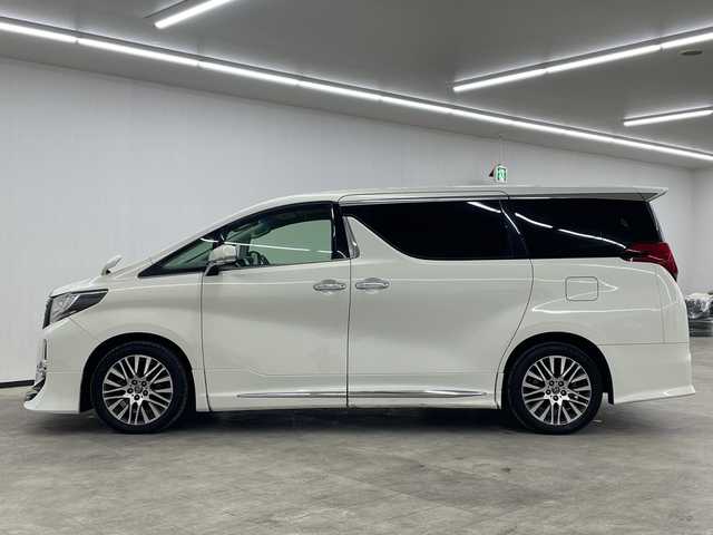トヨタ アルファード S Cパッケージ 長崎県 2015(平27)年 11.9万km ラグジュアリーホワイトパールクリスタルシャインガラスフレーク サンルーフ/アルパイン10インチナビ（EX10）/・フルセグ/・DVD/・Bluetooth/・バックカメラ/アルパインフリップダウン/パワーシート（1列目・2列目）/シートカバー/両側パワースライド/モデリスタエアロ/LEDヘッドライト/純正18インチアルミ/ハンドルヒーター/ウッドコンビハンドル（黒木目調）/フィルム施工/リアサンシェード/ナノイー/オートリトラミラー/シートカバー/ETC/コーナーセンサー/取説・保証書/スマートキー