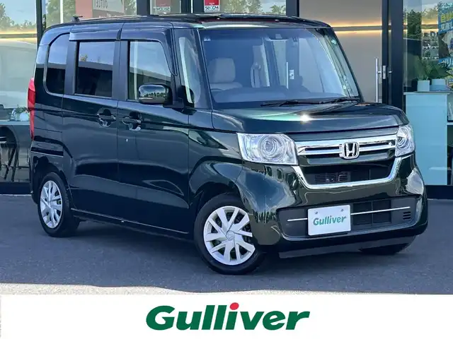 ホンダ Ｎ ＢＯＸ L 栃木県 2022(令4)年 2.7万km ブリティッシュグリーンP 衝突被害軽減ブレーキ/純正SDナビ/フルセグTV/DVD/Bluetooth/USB/バックカメラ/前ドライブレコーダー/前席シートヒーター/片側パワースライドドア/クルーズコントロール/スマートキー×1/プッシュスタート/ステアリングリモコン/LEDオートライト/純正14インチホイールキャップ/アイドリングストップ/横滑り防止装置/取説