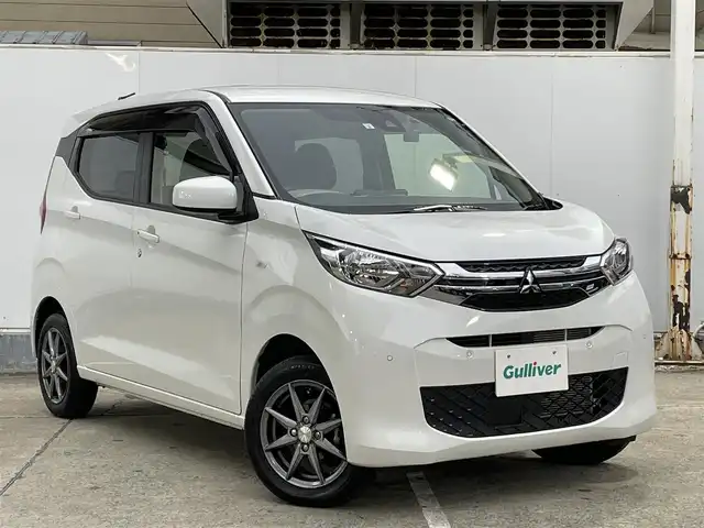 三菱 ｅＫワゴン G 青森県 2021(令3)年 0.4万km シルキーホワイト ワンオーナー /4WD/社外メモリナビ/ (CD/DVD/BT)/ワンセグTV/バックカメラ/コーナーセンサー/前席シートヒーター /ステアリングリモコン/社外ドライブレコーダー/オートライト/衝突軽減ブレーキ/車線逸脱警報/ふらつき警報/先行車発進お知らせ/標識認識/純正ドアバイザー/純正フロアマット/14インチ社外アルミホイール/積込タイヤ/取扱説明書/保証書