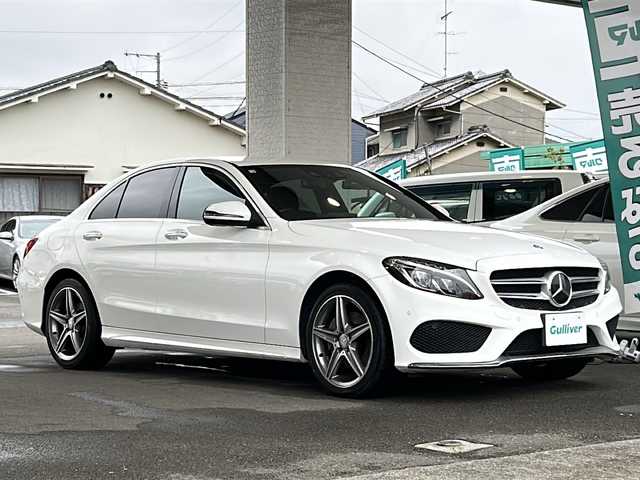 メルセデス・ベンツ Ｃ２００ アバンギャルド AMGライン 愛媛県 2016(平28)年 6.5万km 白 登録時走行距離64719km/純正ナビ/ビルトインETC/バックカメラ/フルセグTV/Bluetooth接続/CD、DVD再生/クルーズコントロール/レザーシート/D席パワーシート/前席シートヒーター/前後ドライブレコーダー/パドルシフト/ステアリングアシスト/オートライト/純正18インチアルミホイール