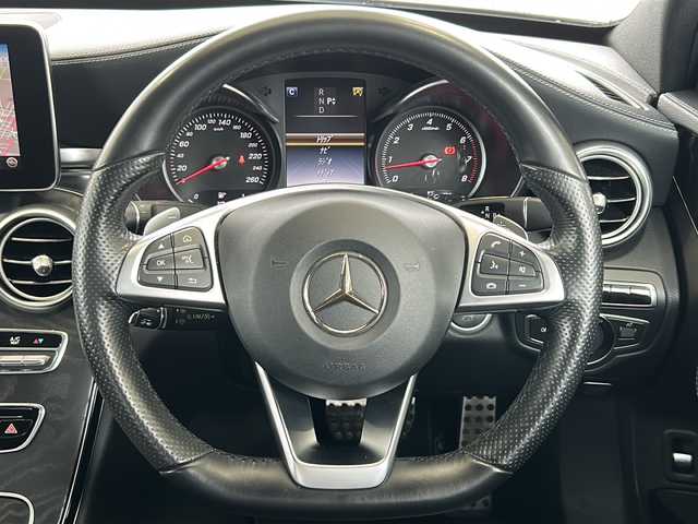 メルセデス・ベンツ Ｃ２００ アバンギャルド AMGライン 愛媛県 2016(平28)年 6.5万km 白 登録時走行距離64719km/純正ナビ/ビルトインETC/バックカメラ/フルセグTV/Bluetooth接続/CD、DVD再生/クルーズコントロール/レザーシート/D席パワーシート/前席シートヒーター/前後ドライブレコーダー/パドルシフト/ステアリングアシスト/オートライト/純正18インチアルミホイール