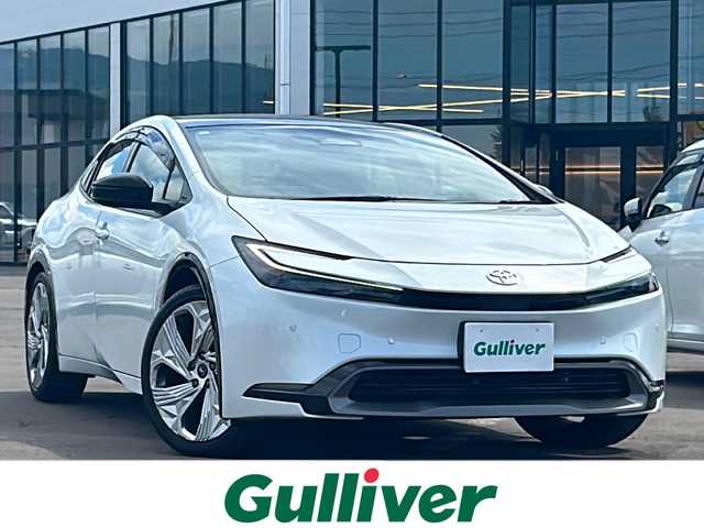 トヨタ プリウス Z 道南・函館 2023(令5)年 1.6万km プラチナホワイトパールマイカ /純正ディスプレイオーディオ//フルセグTV//純正ドライブレコーダー//デジタルインナーミラー//床下透過全周囲カメラ//寒冷地仕様//パノラマルーフ//レザーシート//シートヒーター//ベンチレーション//革巻ステアリング//ステアリングヒーター//ステアリングスイッチ//レーダークルーズモード//LCA//FCTA//横滑り防止//発進遅れ告知//後退速度抑制//パワーバックドア//レーンディパーチャーアラート//BSM//PCS//PDA//クリアランスソナー//RCTA//後方車両接近告知//RCD//PKSB//安心降車アシスト//周辺車両接近時サポート//RSA//EV MODE//DORIVE MODE/ (CUSTOM/SPORT/NORMAL/ECO)//LEDヘッドライト//フォグランプ//オートハイビーム//モデリスタ19インチAW//ETC2.0