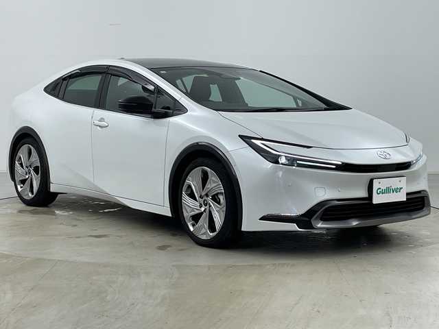 トヨタ プリウス Z 道央・札幌 2023(令5)年 1.6万km プラチナホワイトパールマイカ ・4WD/・寒冷地仕様/・ガラスルーフ/・純正ディスプレイオーディオ/・ナビ&BT&Miracast&フルセグTV/・全方位カメラ/・パワーバックドア/・デジタルインナーミラー/・トヨタセーフティセンス/・レーダークルーズコントロール/・ブラインドスポットモニター/・レザーシート/・D席メモリ機能付パワーシート/・前席シートヒーター&ベンチレーション/・ステアリングヒーター/・置くだけ充電/・AC100V/・ビルトインETC2.0/・クリアランスソナー/・LEDヘッドライト/・オートライト/・オートマチックハイビーム/・スマートキー/・モデリスタ19インチAW