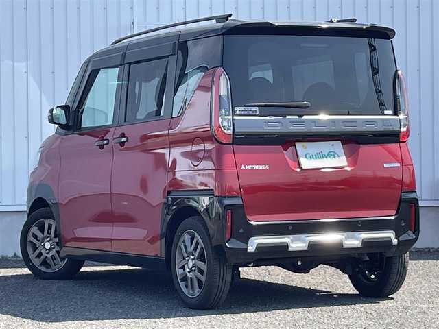 三菱 デリカミニ T プレミアム 熊本県 2024(令6)年 0.7万km アメジストブラック/レッドM 社外ナビ（NDV-D710)/BT/CD/DVD/USB/AM/FM/バックカメラ/全方位カメラ/デジタルルームミラー/両側パワースライドドア/ビルトインETC/前方ドラレコ/本革巻きステアリング/・ステアリングリモコン/・ステアリングヒーター/・パドルシフト/ハーフレザーシート/・D/Nシートヒーター/・シートカバー/ヒルディセントコントロール/e-Assist/・衝突軽減ブレーキ/・踏み間違い防止アシスト/・車線逸脱防止支援機能/・ふらつき警報/・前方衝突予測機能/・標識認識システム/・先行車発進通知/マイパイロット/・レーダークルーズコントロール/・車線維持支援機能/電子パーキングブレーキ/オートブレーキホールド/パーキングセンサー/後席サーキュレーター/・プラズマクラスター/ロールサンシェード/プッシュスタート/スマートキー/電動格納ミラー/・ミラーウィンカー/純正ドアバイザー/社外フロアマット/LEDヘッドライト/・LEDフォグライト