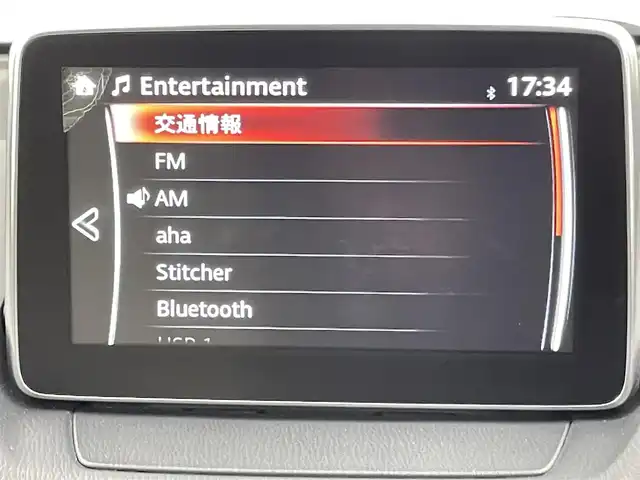 マツダ デミオ 13S Lパッケージ 千葉県 2015(平27)年 1.5万km スノーフレイクホワイトパールマイカ 純正メモリナビ/　CD/DVD/BT/フルセグTV/衝突軽減ブレーキ/レーンキープアシスト/ブラインドスポットモニター/ヘッドアップディスプレイ/ETC/バックカメラ/プッシュスタート&スマートキー/ステアリングスイッチ/革巻きステアリング/HIDヘッドライト/フォグライト/エンケイ17インチアルミホイール