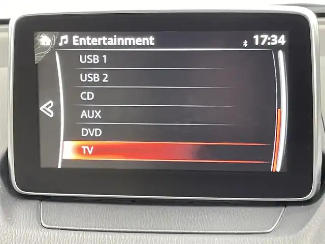 マツダ デミオ 13S Lパッケージ 千葉県 2015(平27)年 1.5万km スノーフレイクホワイトパールマイカ 純正メモリナビ/　CD/DVD/BT/フルセグTV/衝突軽減ブレーキ/レーンキープアシスト/ブラインドスポットモニター/ヘッドアップディスプレイ/ETC/バックカメラ/プッシュスタート&スマートキー/ステアリングスイッチ/革巻きステアリング/HIDヘッドライト/フォグライト/エンケイ17インチアルミホイール