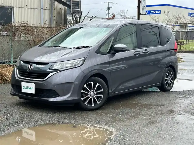 ホンダ フリード G 福岡県 2018(平30)年 3.8万km モダンスティールM 社外７型SDナビ(フルセグTV/CD/DVD/BT)/バックモニター/片側パワスラ/純正フロアマット/純正LEDヘッドライト/社外シートカバー/スペアキー