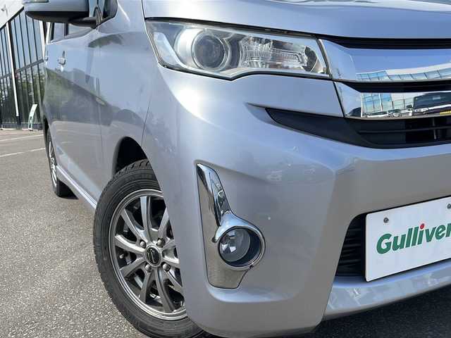 三菱 ｅＫカスタム G 青森県 2015(平27)年 5.6万km クールシルバーメタリック ・４WD/・純正フルセグナビTV/・AM/FM/Bluetooth/CD/DVD/・純正エンジンスターター/・純正フロアマット/・D席シートヒーター/・バックカメラ/・アイドリングストップ/・純正ドアバイザー/・スペアキー/・バニティミラー/・プッシュスタート/・純正AWスタットレスアルミセット積み込み14インチ/・保証書/・取扱説明書