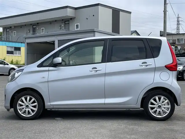 三菱 ｅＫワゴン M 道央・札幌 2017(平29)年 3.4万km クールシルバーメタリック ４WD/純正ディーラーOPナビ/AM/FM/BT/AUX/バックカメラ/アイドリングストップ/デジタルインナーミラー/D席シートヒーター/リモコンキー/ハロゲンヘッドライト/ヘッドライトレベライザー/電動格納ミラー/純正フロアマット/スペアキー/鉄チンホイール付冬タイヤ積込/155/65/R14/2017年/山5mm