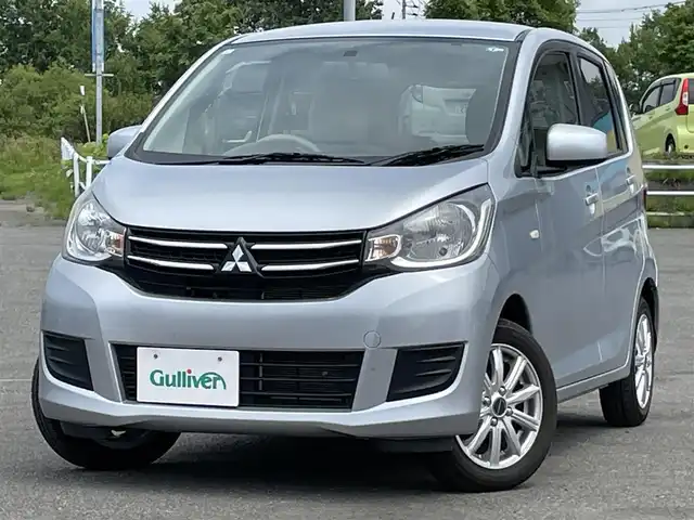 三菱 ｅＫワゴン M 道央・札幌 2017(平29)年 3.4万km クールシルバーメタリック ４WD/純正ディーラーOPナビ/AM/FM/BT/AUX/バックカメラ/アイドリングストップ/デジタルインナーミラー/D席シートヒーター/リモコンキー/ハロゲンヘッドライト/ヘッドライトレベライザー/電動格納ミラー/純正フロアマット/スペアキー/鉄チンホイール付冬タイヤ積込/155/65/R14/2017年/山5mm