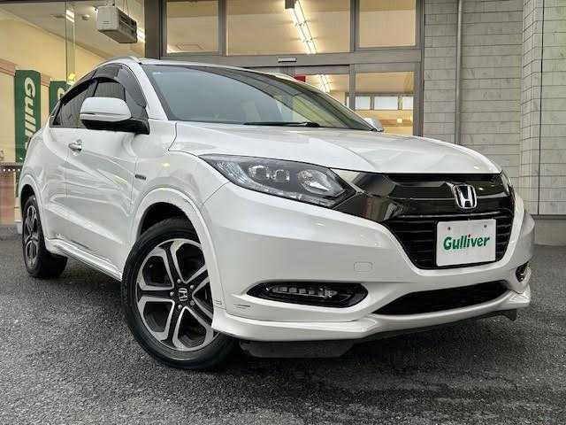 ホンダ ヴェゼル ハイブリッド Z ホンダセンシング 埼玉県 2017(平29)年 4.8万km ホワイトオーキッドパール 純正8インチナビ/【CD/DVD/フルセグ/Bluetooth】/衝突軽減ブレーキ/レーダークルーズコントロール/バックカメラ/ETC/シートヒーター/横滑り防止装置/アイドリングストップ/ハーフレザーシート/スペアキー